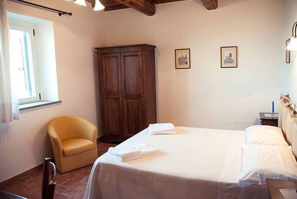 Il Poggio Delle Ginestre Guest House Torgiano Luaran gambar
