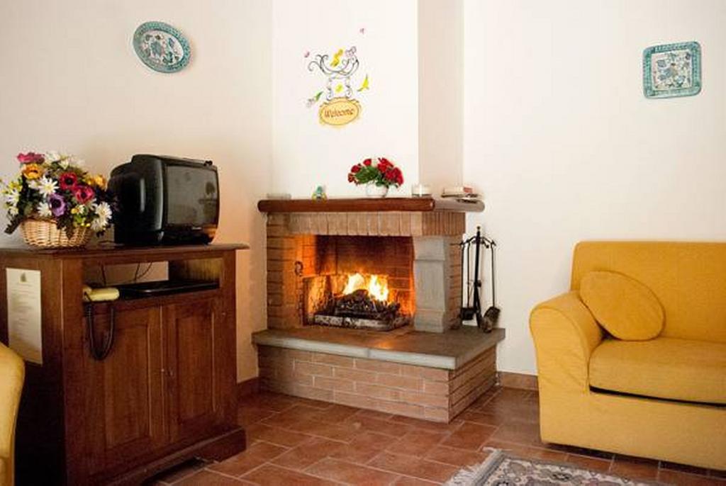 Il Poggio Delle Ginestre Guest House Torgiano Luaran gambar